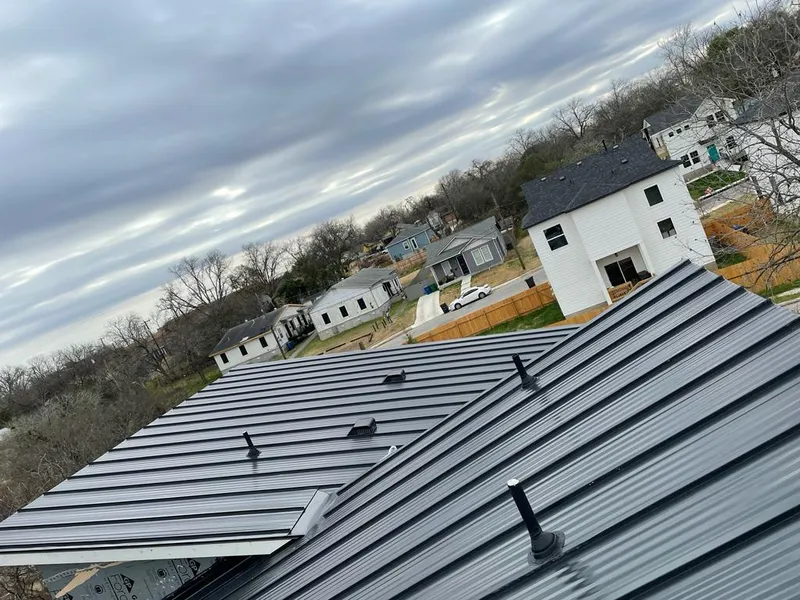 Standing seam metal roof panels with vents for Skylight Repair in Holmen